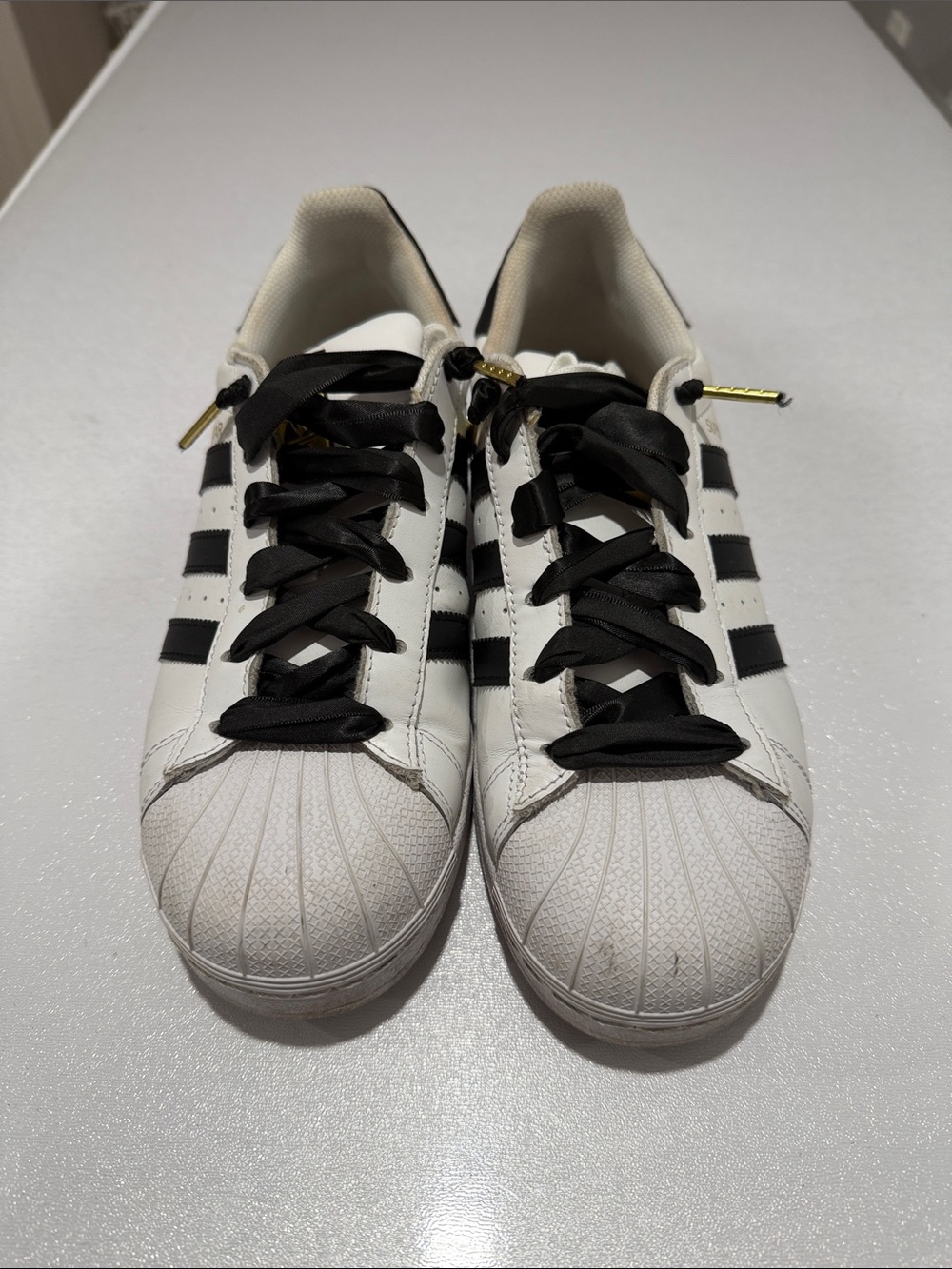 adidas White and Black Superstar Sneakers